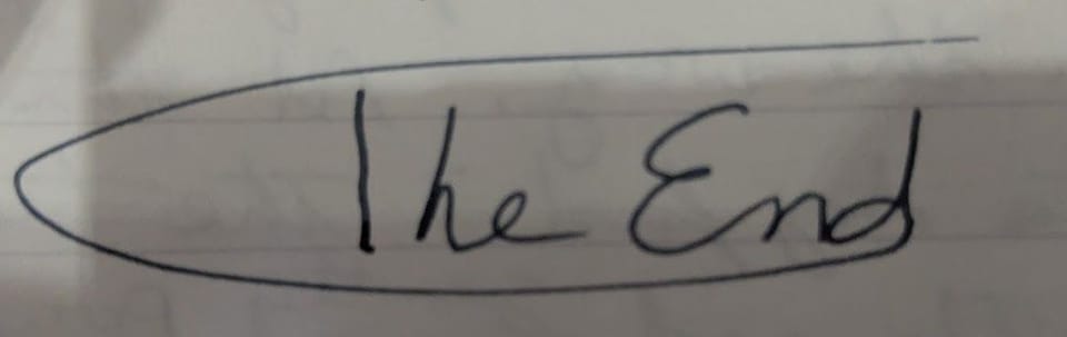 The words "The End" written in ink on paper with an artistic flourish.